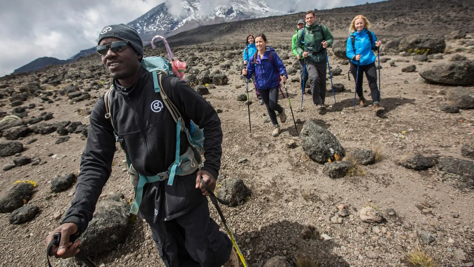 Guide leading trekkers at a steady pace